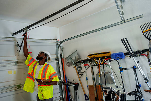 Professional Garage Door Panel Replacement technician working in Wellington, UT